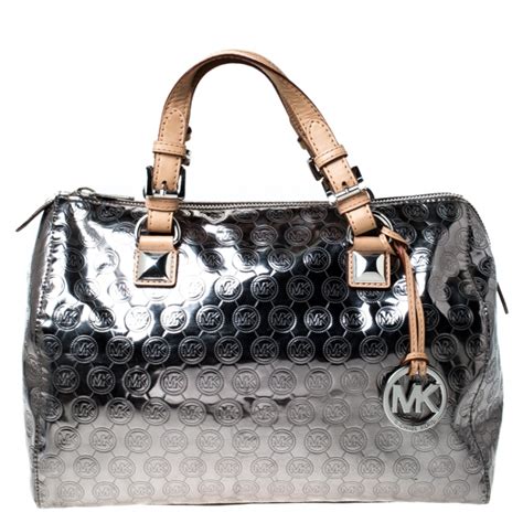 silver michael kors bag with pockets|Michael Kors metallic silver handbags.